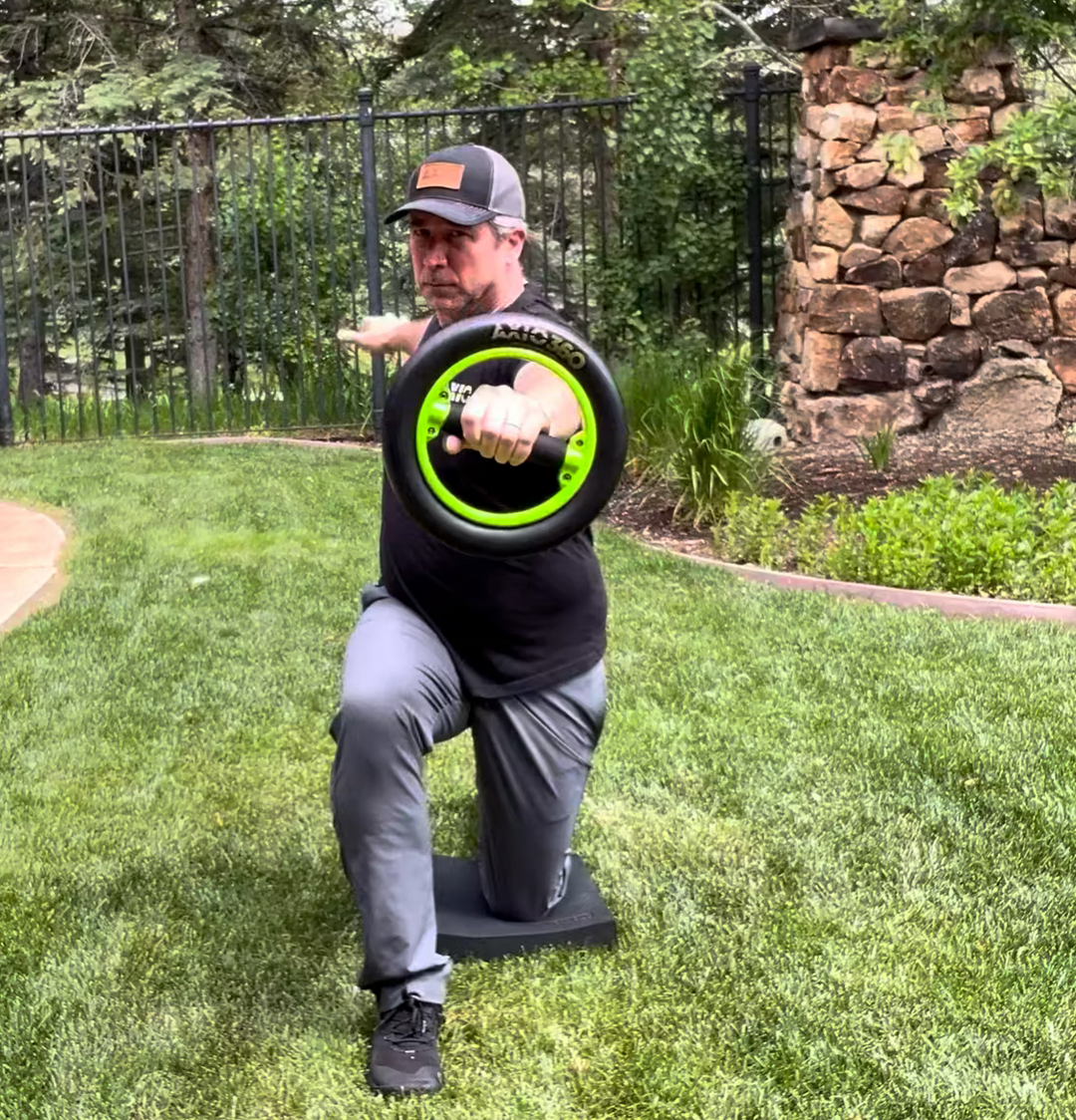 One Arm Reach Torso Turns in 1/2 Kneeling