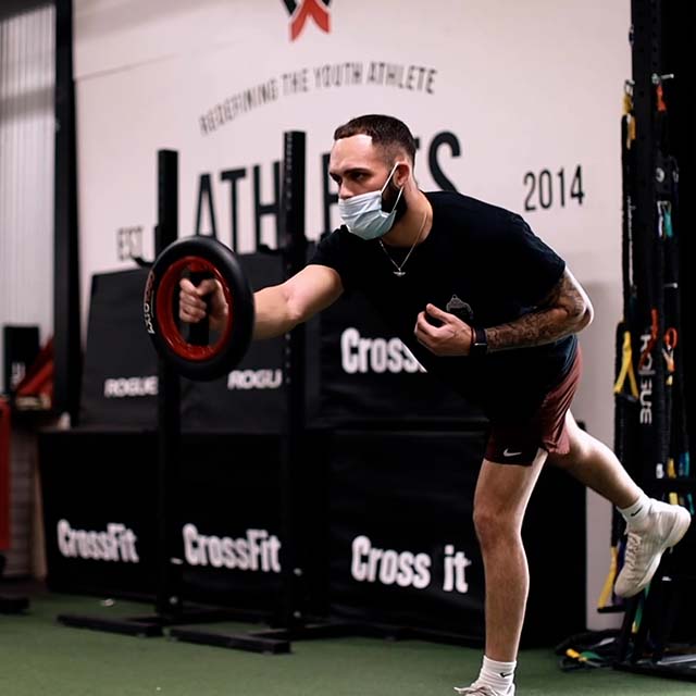 Single leg 1 arm balance exercise using AXIO 1080