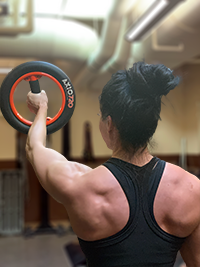 Shoulder definition of woman using AXIO 720 Centripetal Trainer
